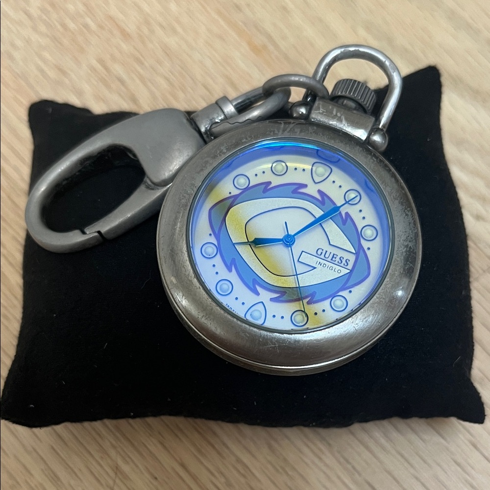 Guess Silver Pocket Watch with Blue and Yellow Accents